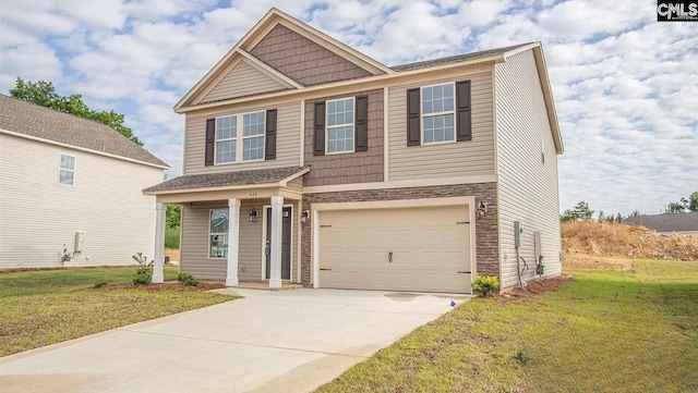 craftsman-style house featuring a garage, a front lawn, stone siding, and concrete driveway