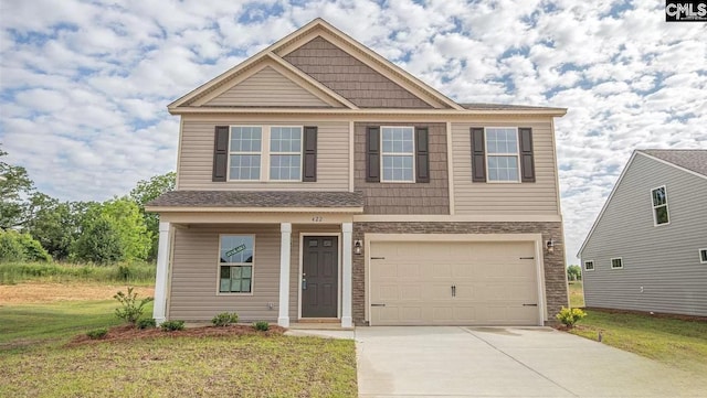 craftsman inspired home featuring an attached garage, stone siding, driveway, and a front yard