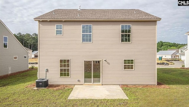 back of house with a patio, a yard, and cooling unit