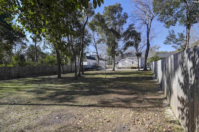 view of yard featuring fence
