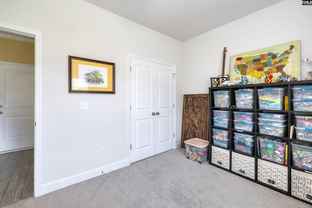 carpeted bedroom with baseboards