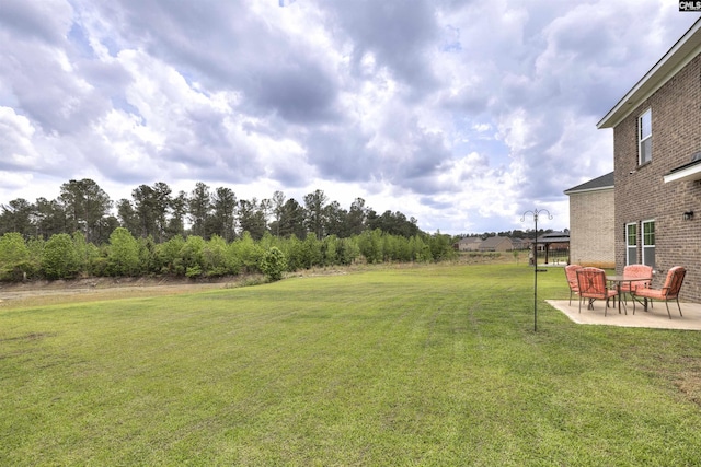 view of yard with a patio area