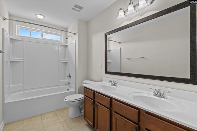 full bath with toilet, shower / bath combination, a sink, and tile patterned floors