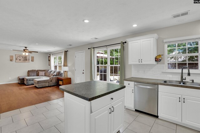 kitchen with a healthy amount of sunlight, visible vents, dishwasher, a sink, and recessed lighting