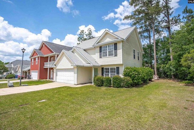 traditional home with an attached garage, roof with shingles, a front yard, and concrete driveway