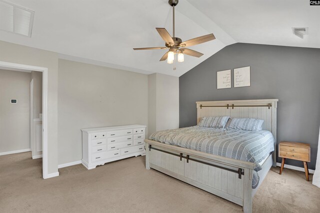 bedroom with baseboards, carpet, vaulted ceiling, and visible vents