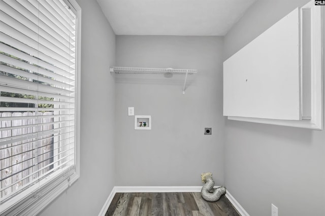laundry room with laundry area, wood finished floors, baseboards, hookup for a washing machine, and hookup for an electric dryer