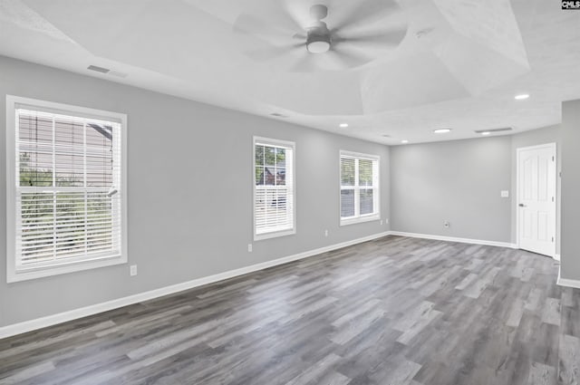 unfurnished room with dark wood-type flooring, recessed lighting, baseboards, and ceiling fan