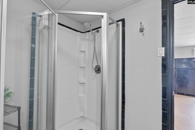 full bath featuring a shower stall