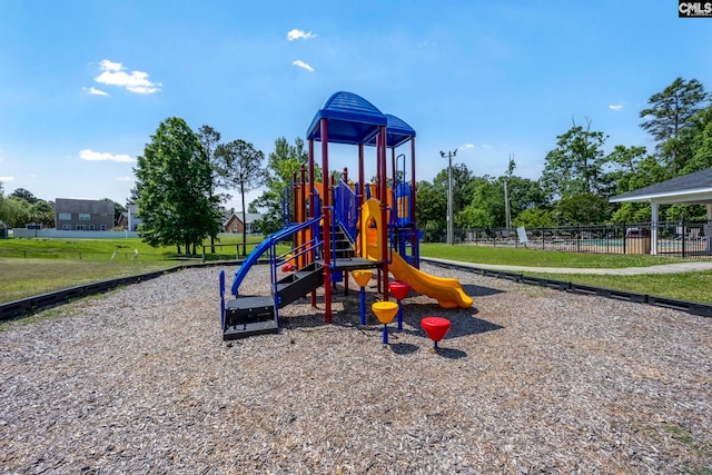 community jungle gym with fence