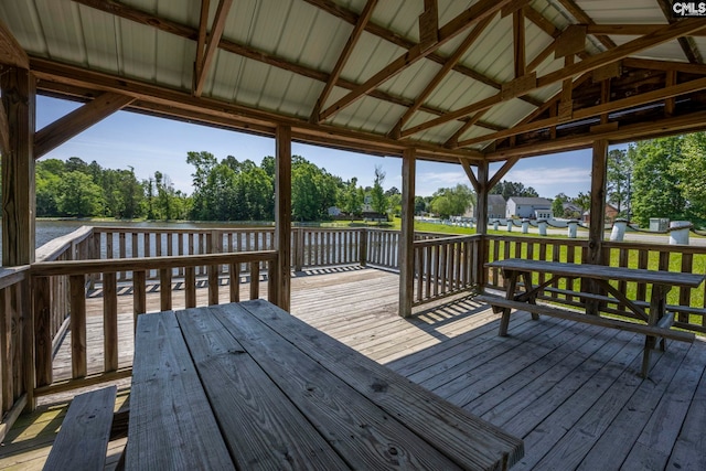 wooden deck with a water view