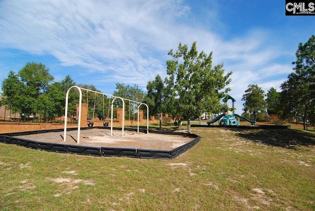 community jungle gym featuring a yard