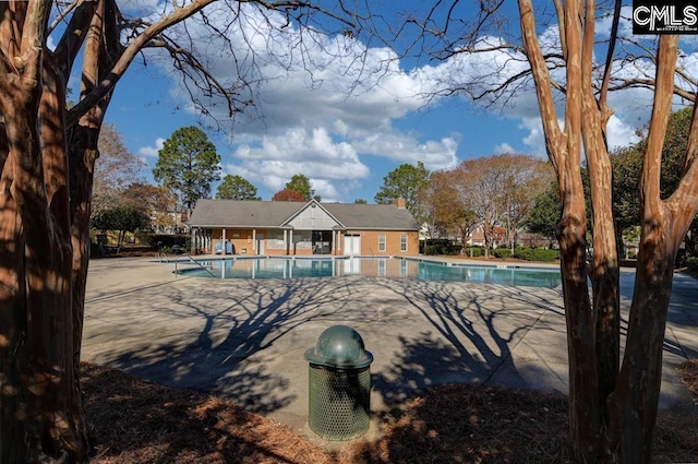 community pool featuring a patio