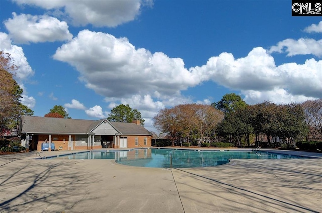 pool featuring a patio area