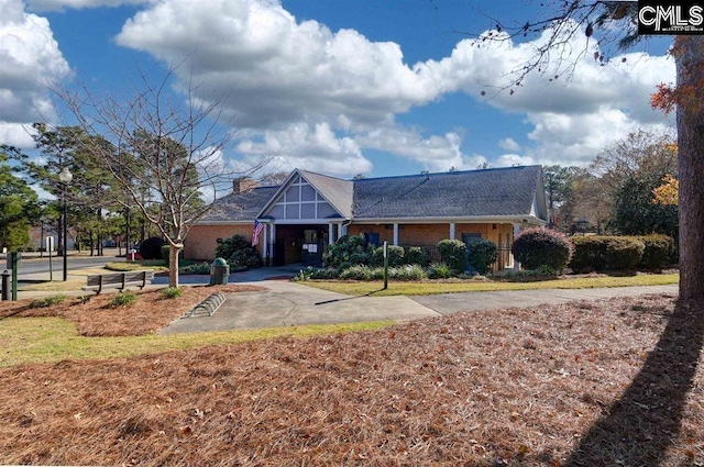 view of front of home featuring a chimney