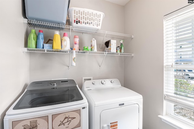 472 Westmoreland Rd, Columbia, SC 29229 - laundry area with washing machine and clothes dryer, laundry area, and a wealth of natural light