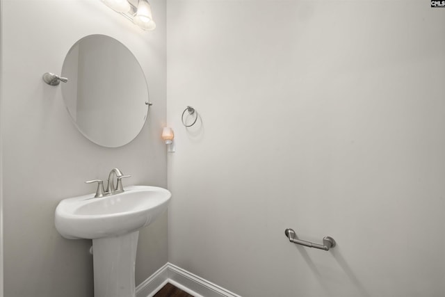 11249 Island View Ln, Lancaster, SC 29720 - bathroom with baseboards and wood finished floors