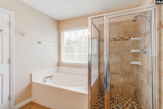 full bath featuring a shower stall and a bath