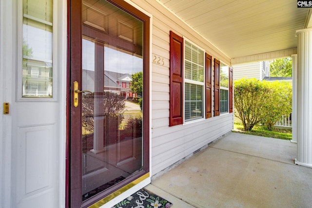 entrance to property with covered porch