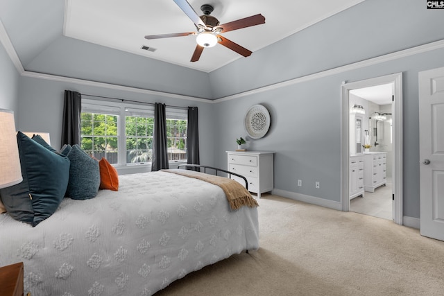 carpeted bedroom with crown molding, a ceiling fan, baseboards, ensuite bathroom, and visible vents
