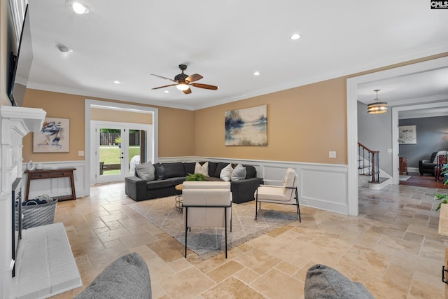 living area with stairway, ornamental molding, recessed lighting, and stone tile flooring
