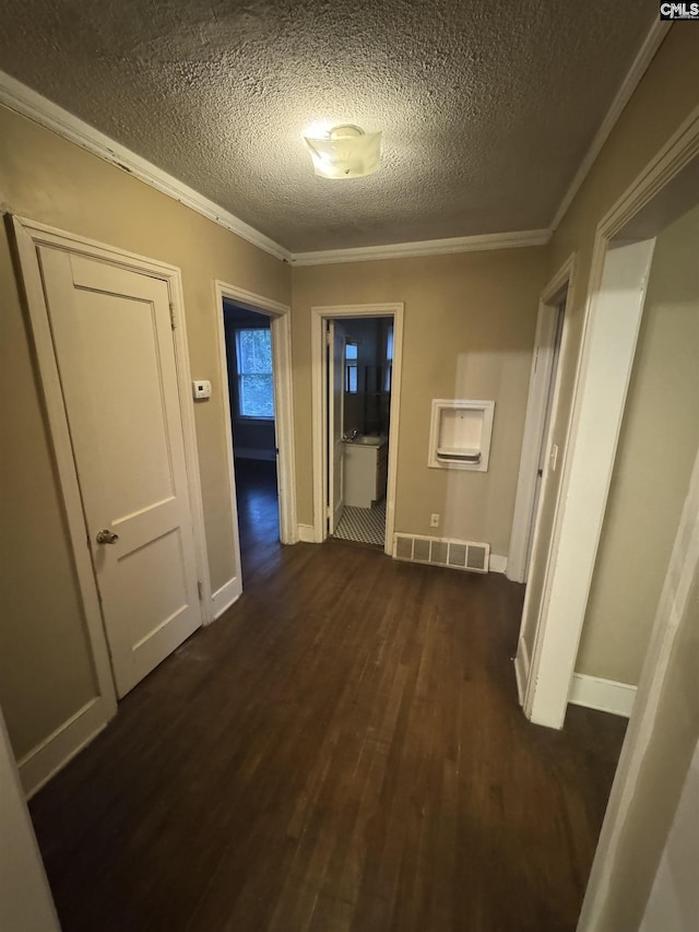 4906 Bethel Church Rd, Columbia, SC 29206 - hall with crown molding, a textured ceiling, dark wood-style floors, and baseboards