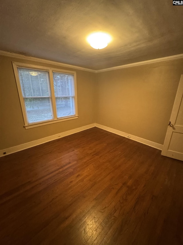 4906 Bethel Church Rd, Columbia, SC 29206 - empty room with crown molding, baseboards, and dark wood-style floors