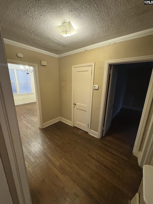 4906 Bethel Church Rd, Columbia, SC 29206 - corridor with crown molding, a textured ceiling, dark wood-type flooring, and baseboards