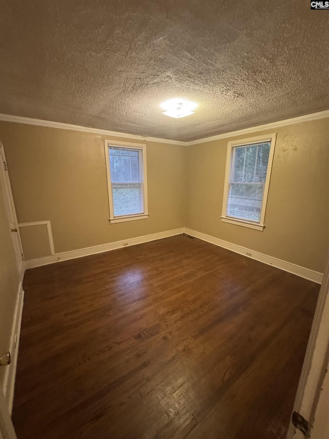 4906 Bethel Church Rd, Columbia, SC 29206 - spare room with crown molding and a textured ceiling