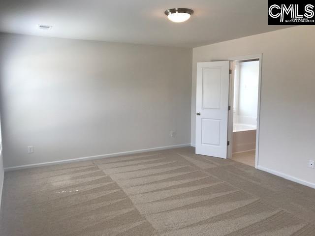 730 Lansford Bay Dr, West Columbia, SC 29172 - carpeted spare room with baseboards