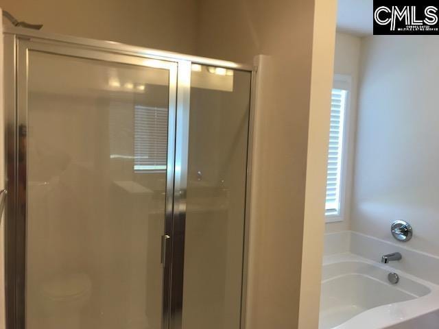 730 Lansford Bay Dr, West Columbia, SC 29172 - full bath with a shower stall and a garden tub