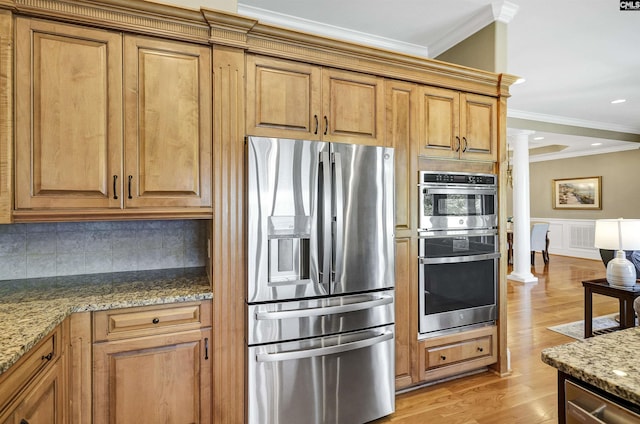 305 Marina Ct, Lexington, SC 29072 - kitchen with crown molding, light wood-style floors, stainless steel appliances, stone counters, and ornate columns