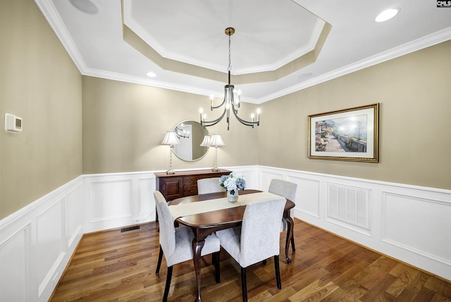 305 Marina Ct, Lexington, SC 29072 - dining area featuring visible vents, a notable chandelier, wood finished floors, and a raised ceiling