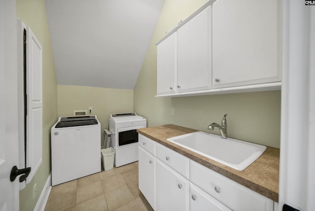 305 Marina Ct, Lexington, SC 29072 - washroom featuring cabinet space, light tile patterned flooring, washing machine and dryer, and a sink