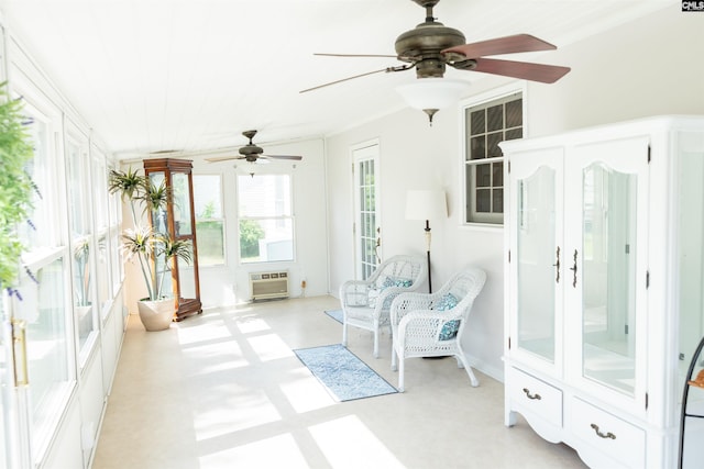 sunroom / solarium featuring french doors and a wall unit AC