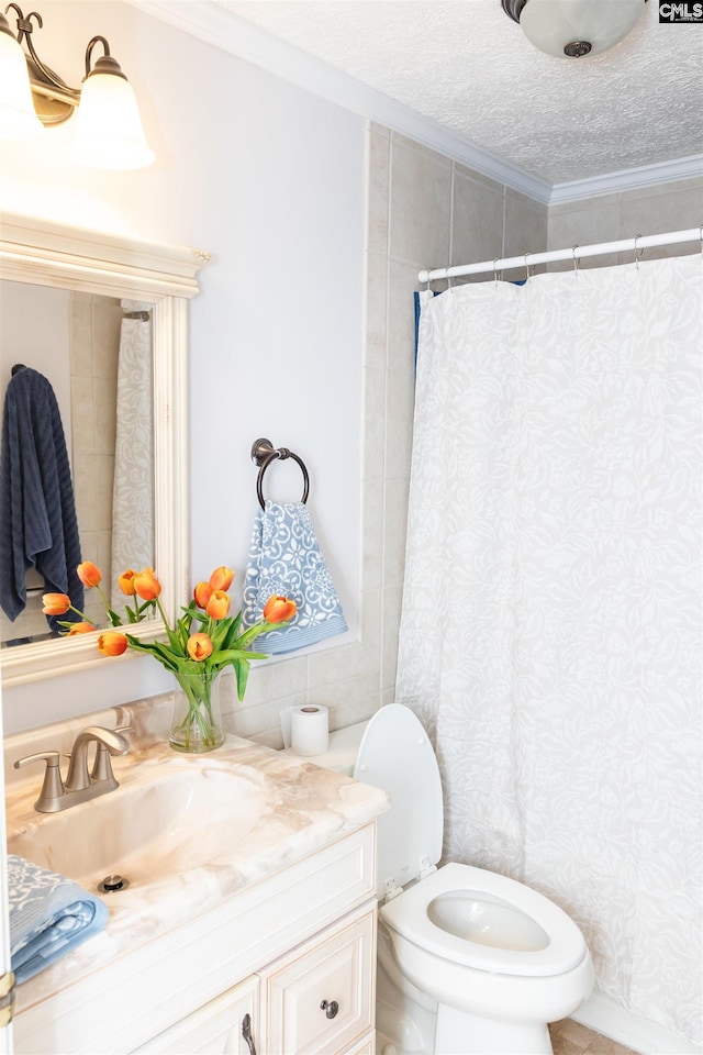 bathroom with vanity, ornamental molding, curtained shower, toilet, and wallpapered walls