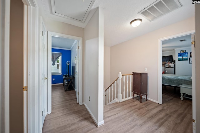 120 Coventry Lake Dr, Lexington, SC 29072 - hallway with an upstairs landing, wood finished floors, and baseboards