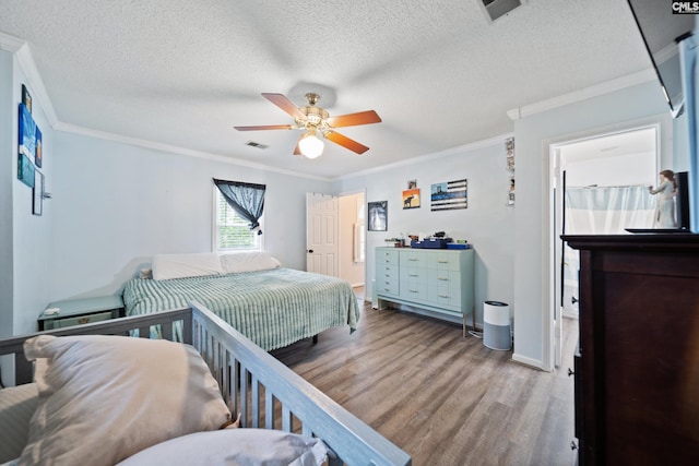 120 Coventry Lake Dr, Lexington, SC 29072 - bedroom with a textured ceiling, visible vents, ornamental molding, and wood finished floors