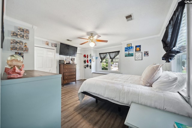120 Coventry Lake Dr, Lexington, SC 29072 - bedroom with crown molding, wood finished floors, a textured ceiling, and a ceiling fan
