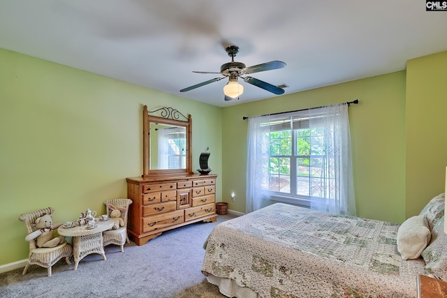 bedroom with carpet floors, baseboards, and ceiling fan