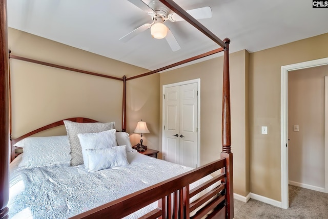 bedroom with baseboards, a ceiling fan, and light colored carpet