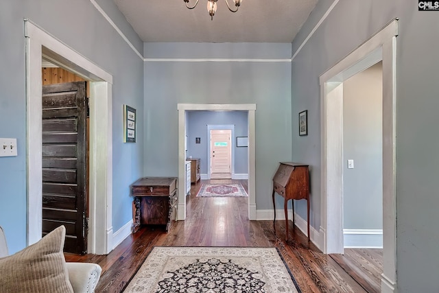 215 Greenbrier Mossydale Rd, Winnsboro, SC 29180 - entryway with baseboards, wood finished floors, and a chandelier