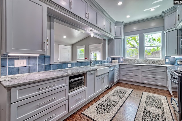 215 Greenbrier Mossydale Rd, Winnsboro, SC 29180 - kitchen featuring tasteful backsplash, a sink, dishwasher, gas stove, and gray cabinetry