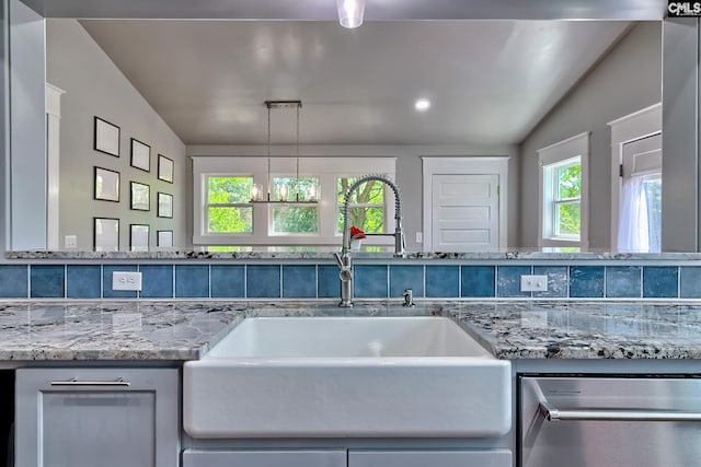 215 Greenbrier Mossydale Rd, Winnsboro, SC 29180 - kitchen with light stone counters, a sink, dishwasher, and a wealth of natural light