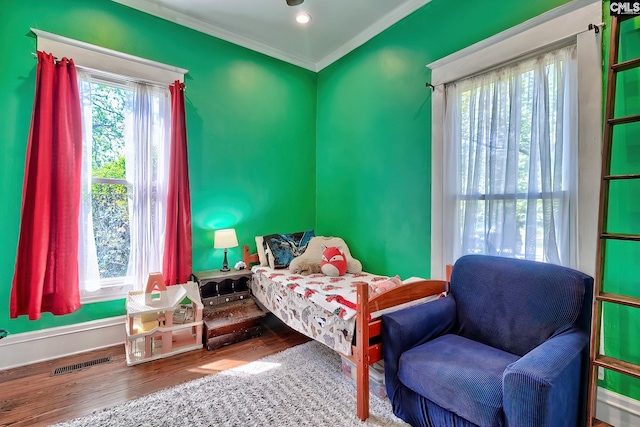 215 Greenbrier Mossydale Rd, Winnsboro, SC 29180 - bedroom with visible vents, ornamental molding, and wood finished floors