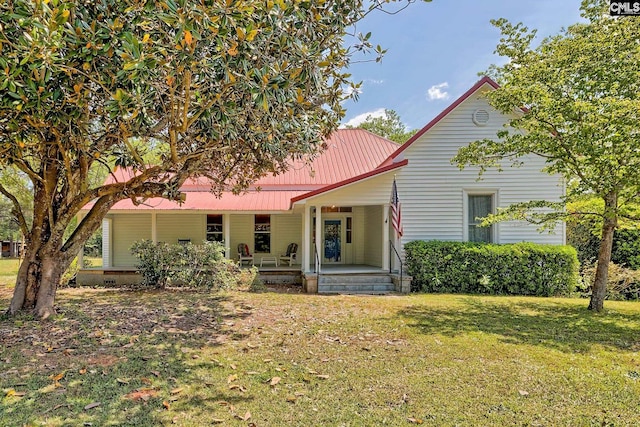 215 Greenbrier Mossydale Rd, Winnsboro, SC 29180 - rear view of property featuring a yard, covered porch, and metal roof