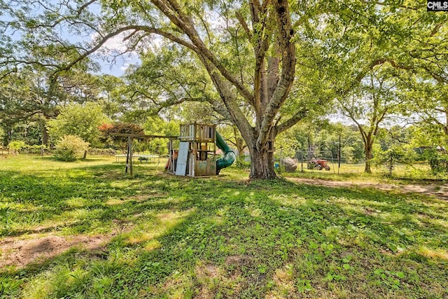 215 Greenbrier Mossydale Rd, Winnsboro, SC 29180 - view of yard with a playground and fence