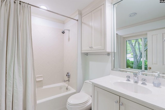 bathroom featuring vanity, shower / bath combo, and toilet