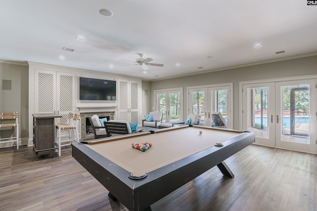 game room featuring crown molding, visible vents, wood finished floors, french doors, and billiards