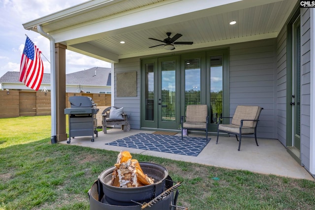2358 High Bluff Loop, Lexington, SC 29072 - view of patio featuring a fire pit, fence, a grill, french doors, and a ceiling fan